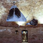 A. M. HOCH; Metamorfosi di una barca: first level of installation (circular basement floor) in castle tower: central room with painted mirrors suspended with wires and pulleys, with three alcoves with painted mirrors; approximately 13.78 ft (height) x 21.5 ft (diameter); 2011