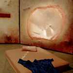 A. M. HOCH, Mitosis: Formation of Daughter Cells, DETAIL: projected video loop of continuous handwriting on mattress, 2004