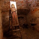 A. M. HOCH, Detail of alcove #1: Young Girl on a Ladder, painted mirror on ladder, approximately 75 x 15.75 inches, 2011