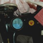 A. M. HOCH, Mitosis: Formation of Daughter Cells, DETIAL, sewing machine with embedded video loop of girl playing dress up infront of a mirror, 2004