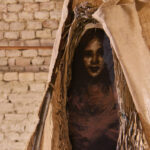 Detail shot of painted mirror imbedded in Cocoon Boat