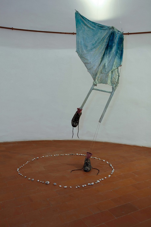 A. M. HOCH, third level of castle tower: Metamorphosis with Umbrella; mixed media including umbrella, resin, metal, and oil paint; approximately 73.6 x 23.6 inches; 2010/2011