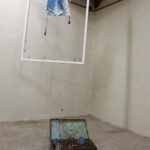 A. M. HOCH, fourth level of castle tower: Gone; mixed media including cloth, resin, oil paint, suitcase, copper, and wire; 98.5 (h) inches x 39.5 (w) x 36 inches (d) inches 2010/11