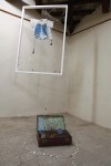 A. M. HOCH, fourth level of castle tower: Gone; mixed media including cloth, resin, oil paint, suitcase, copper, and wire; 98.5 (h) inches x 39.5 (w) x 36 inches (d) inches 2010/11