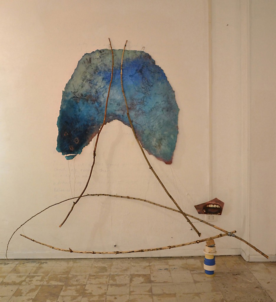 A. M. HOCH, Here Now Am (Breathing Vessel), studio installation, mixed media including oil on resin-coated fabric with embedded wires; painted mirror; branches; stack of masking tape; approximately 224 x 244 cm (88 x 96 inches), 2014