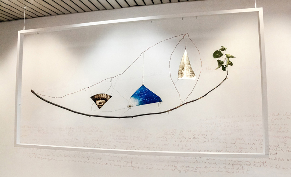 AM HOCH, Young Boat (Future Reflection Sister Past), site-specific installation at SetUp Art Fair 2015 in Bologna; painted mirrors, copper wire, branch; approximately 130 x 240 cm, (51 x 94.5 inches), 2014/2015.
